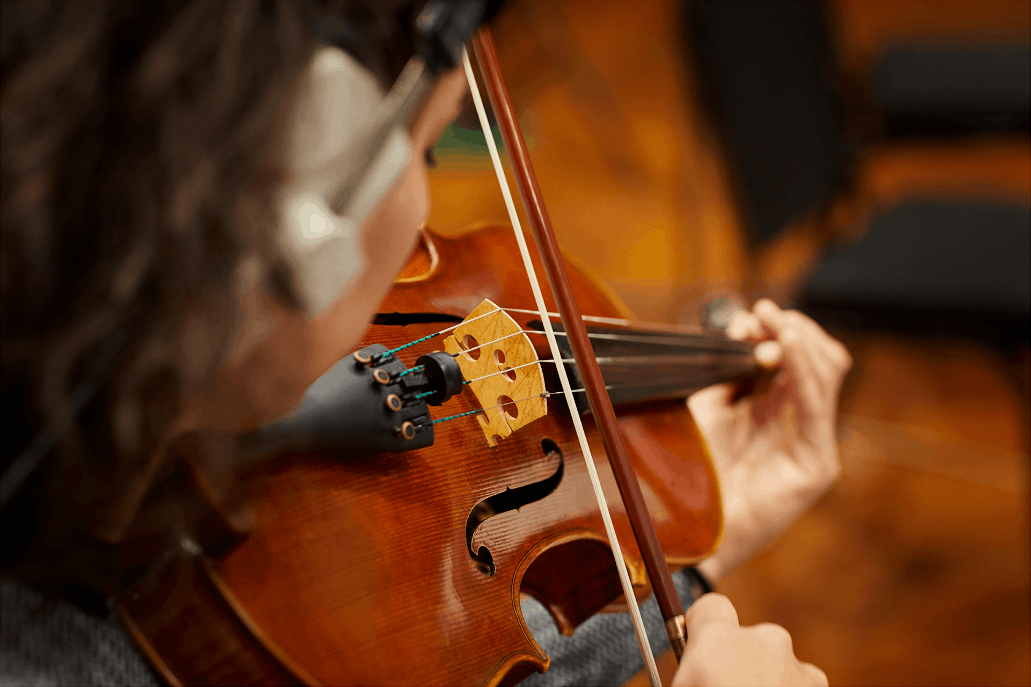 Violinist bowing up close