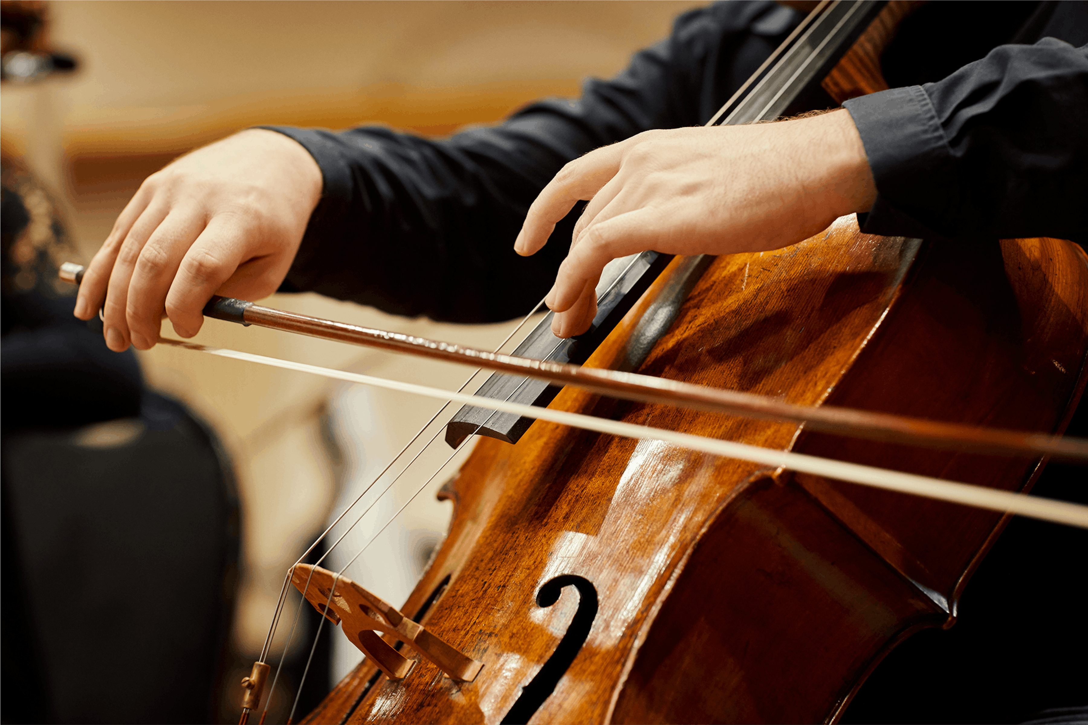 Cellist bowing up close