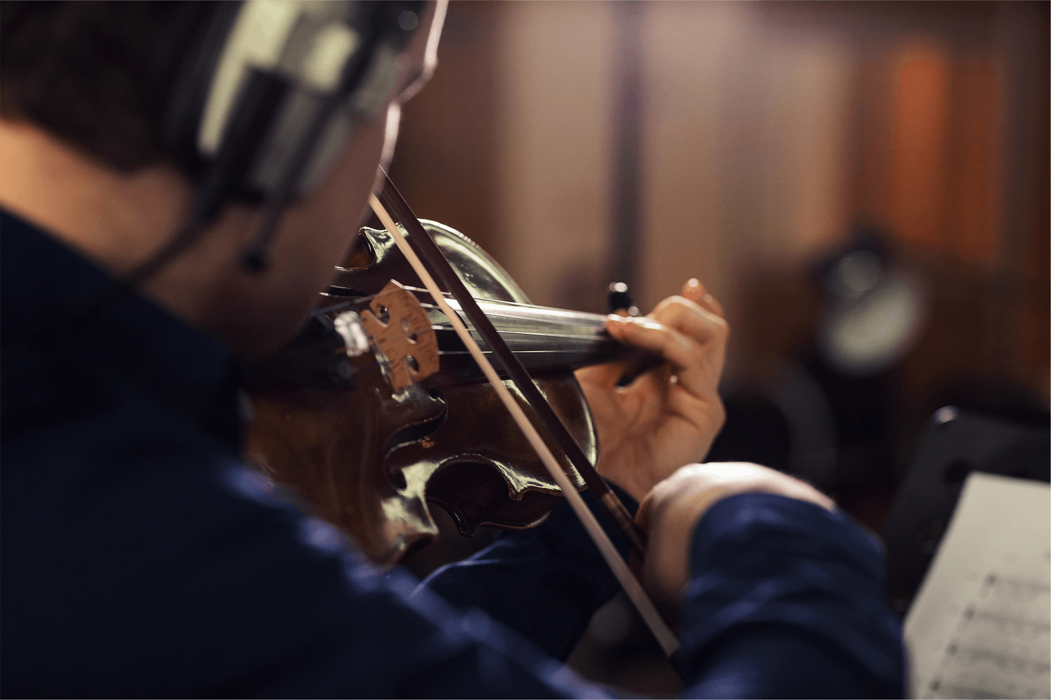 Violinist bowing up close