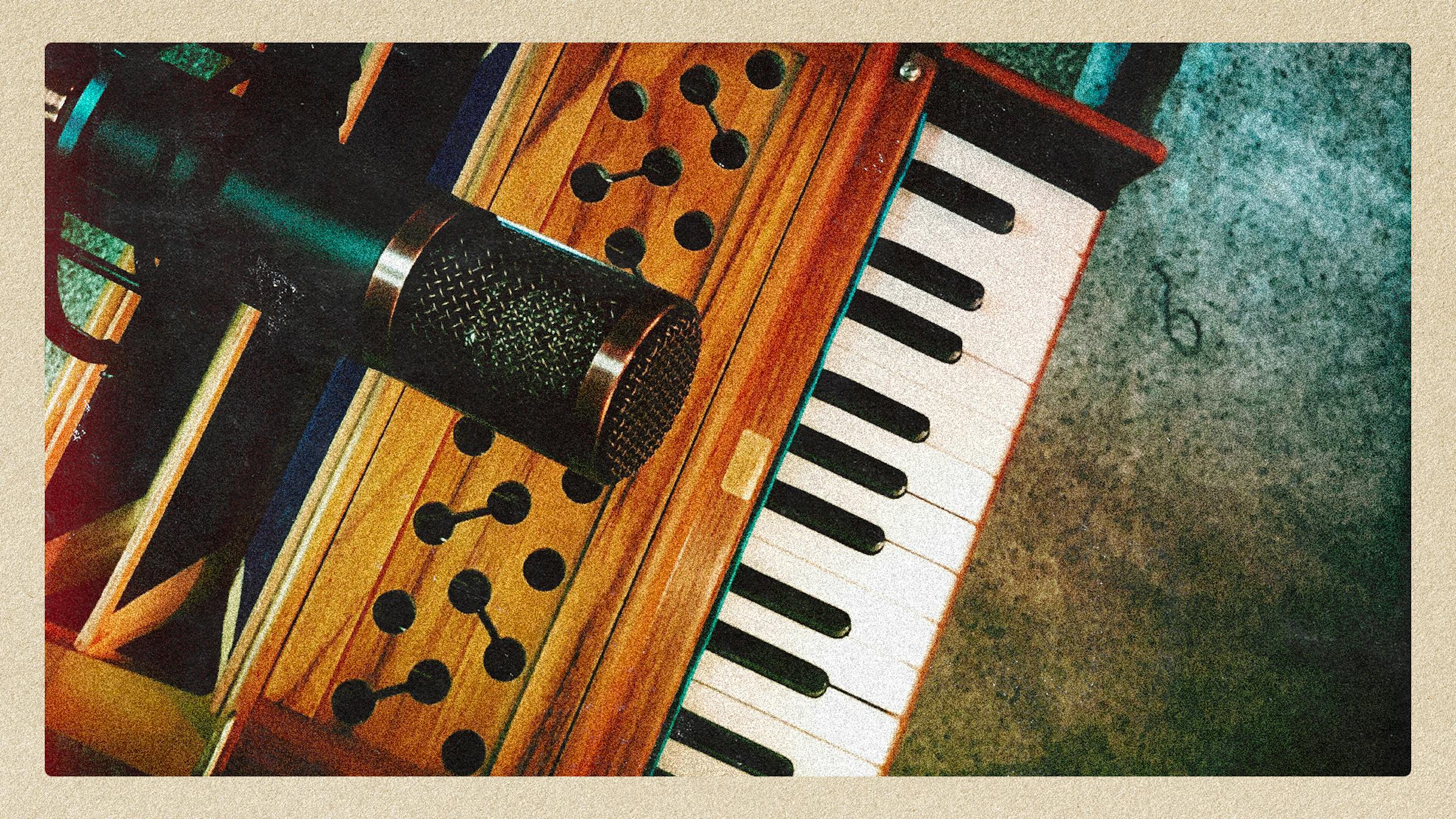 A microphone over a piano