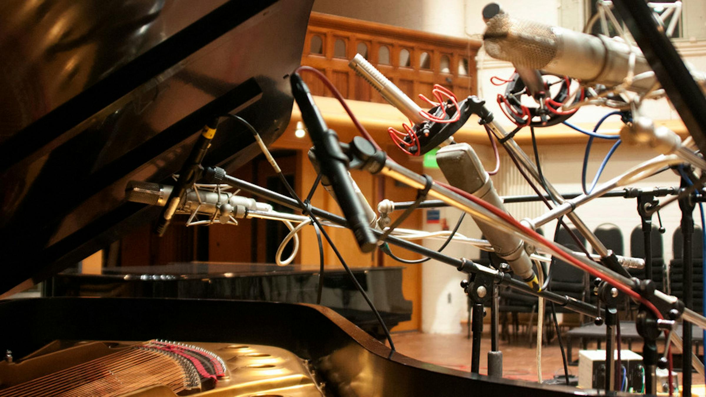 Close up of mics under lid of piano