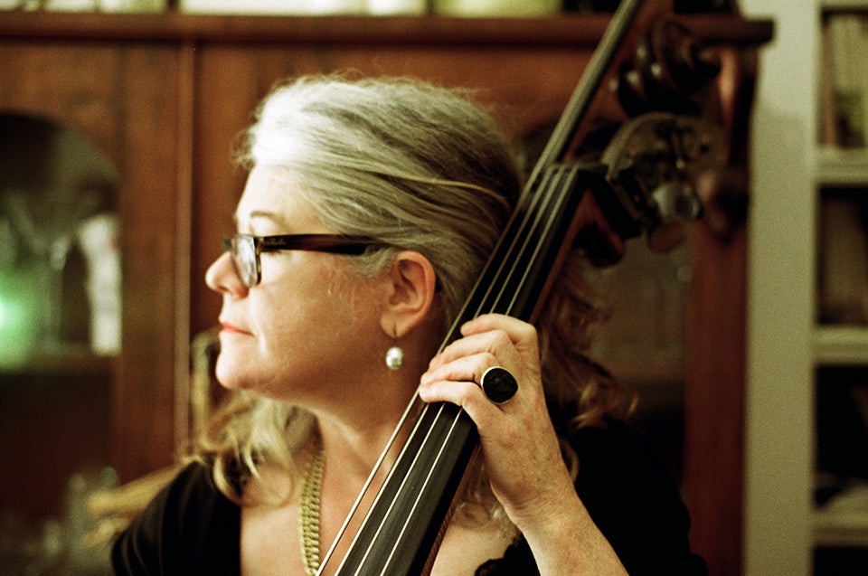 Mary Scully headshot with double bass