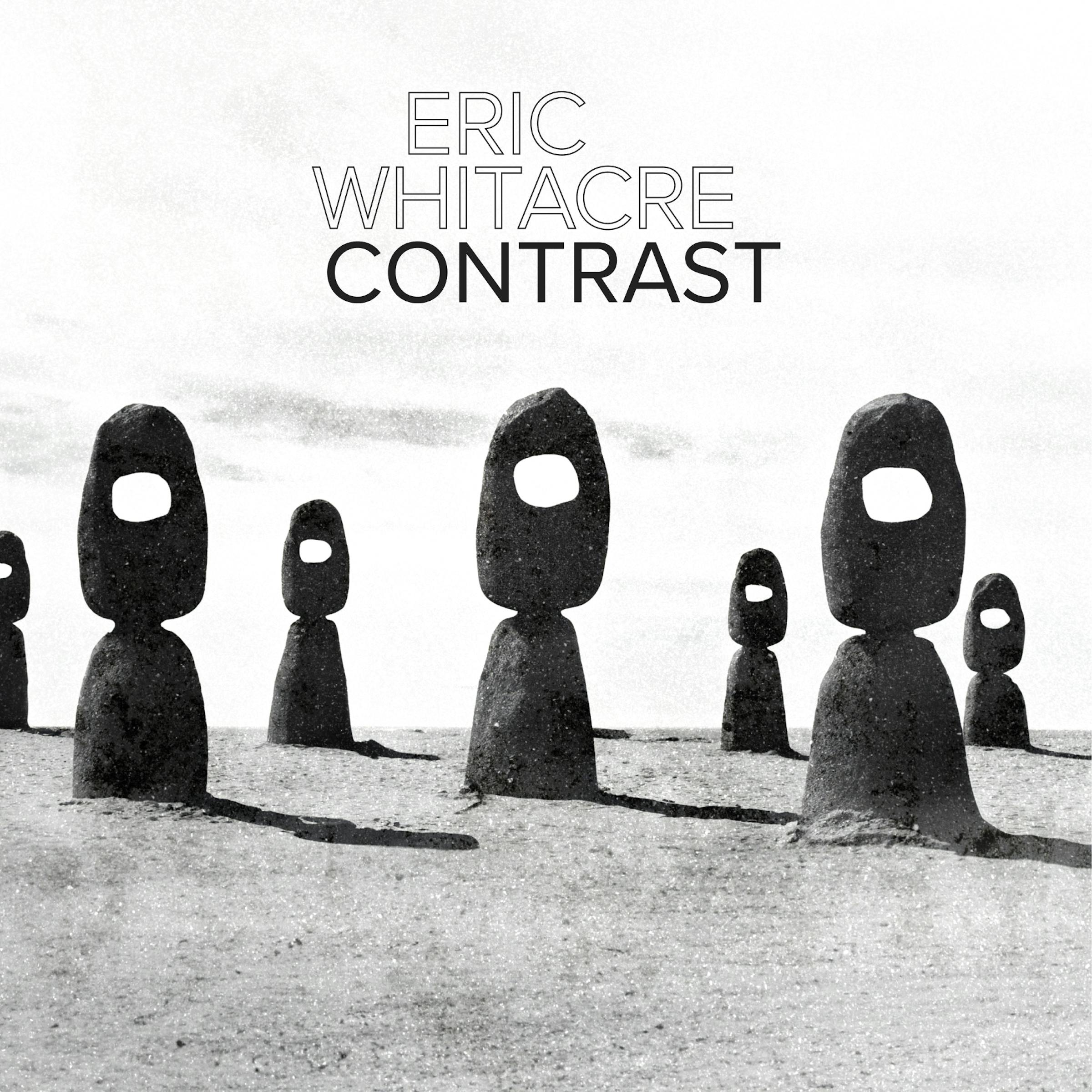 Eric Whitacre Contrast artwork. Creepy black stone totems in a field.