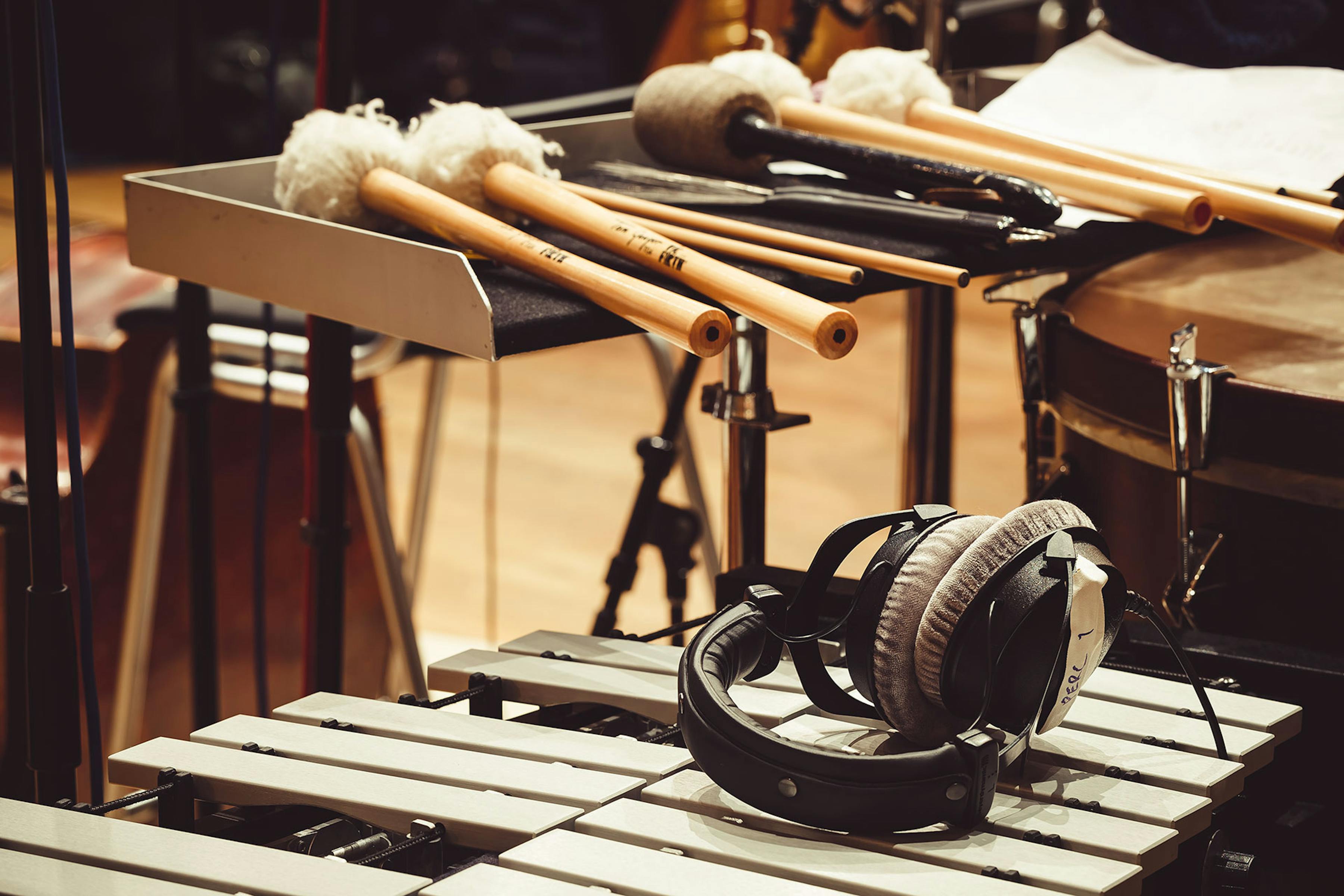 Close up of percussion instruments with sticks and mallets
